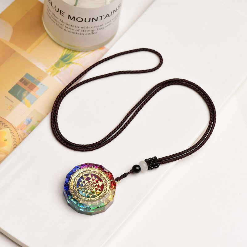 Full view of the necklace on a white ceramic plate