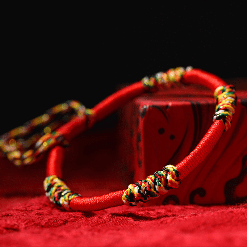 Bracelet leaning against a jewelry box