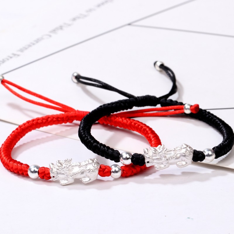 Black and red bracelets stacked together