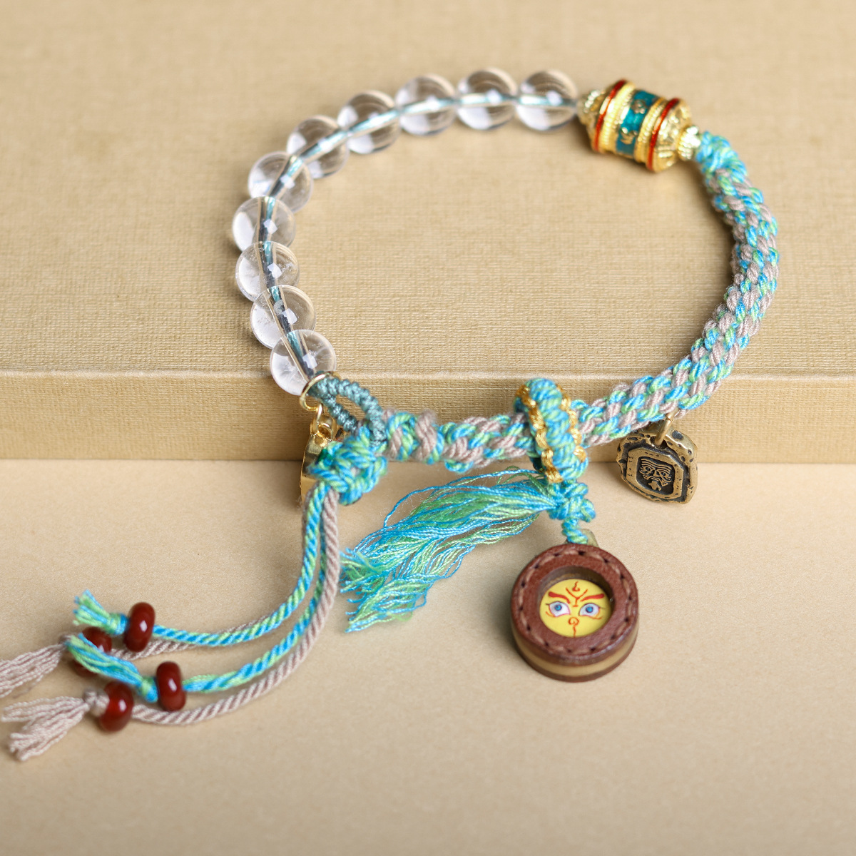 Bracelet resting on the edge of a jewelry tray