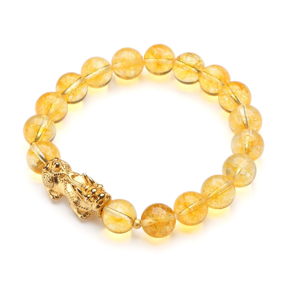 45-degree angled view of golden Pixiu citrine bracelet