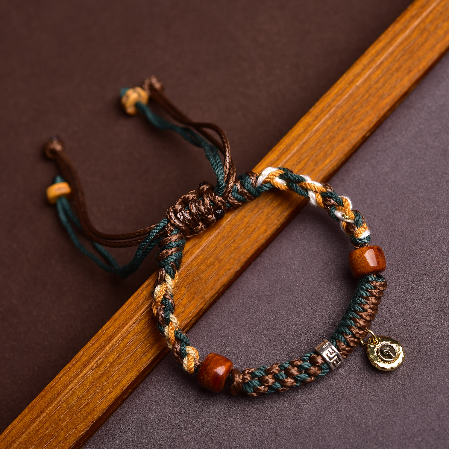 Bracelet on the edge of a jewelry tray