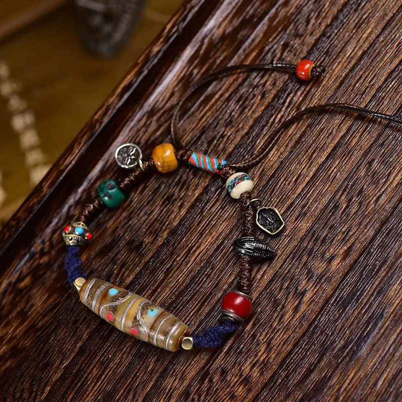 Full view of the bracelet on a wooden table