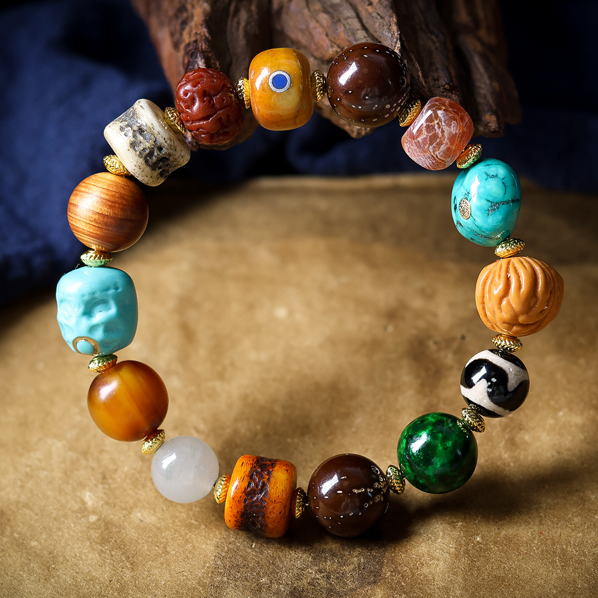Full view of multigemstone Tibetan bracelet with traditional elements