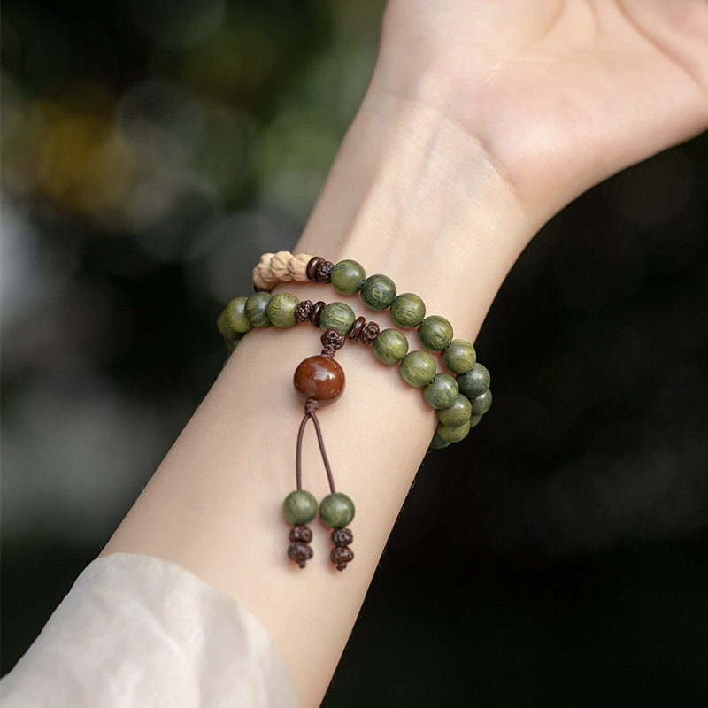 Model wearing the Verdant Harmony Double Wrap Bracelet