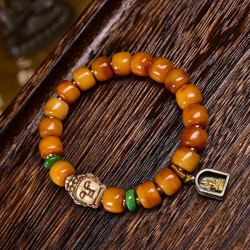 Full view of yak bone bracelet on weathered wood